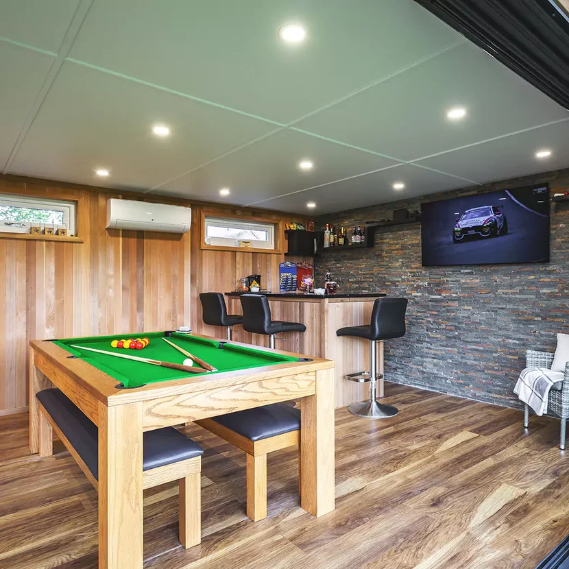 Games room with pool table and bar area